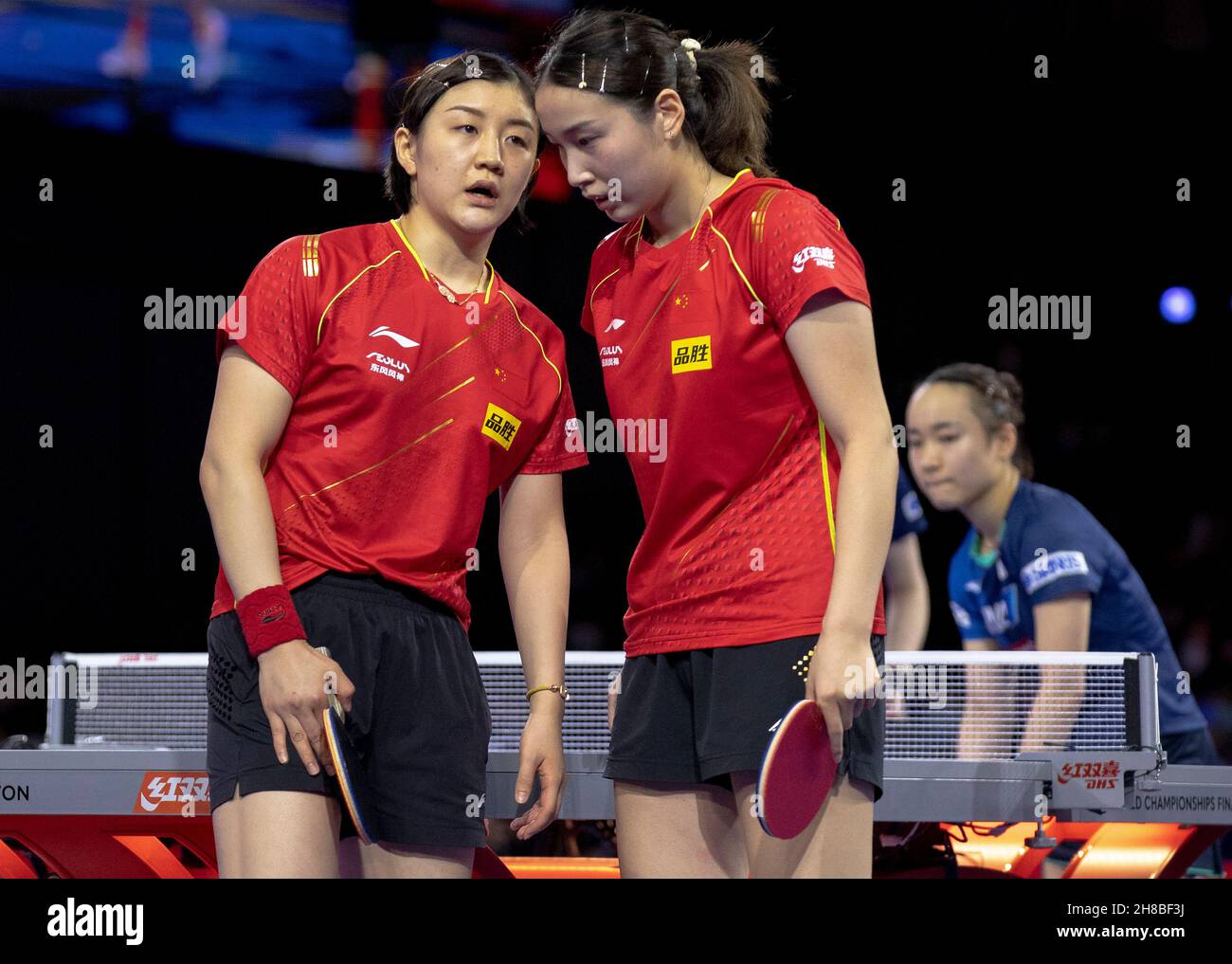 Houston. 28th Nov, 2021. China's Chen Meng (L)/Qian Tianyi (C) compete