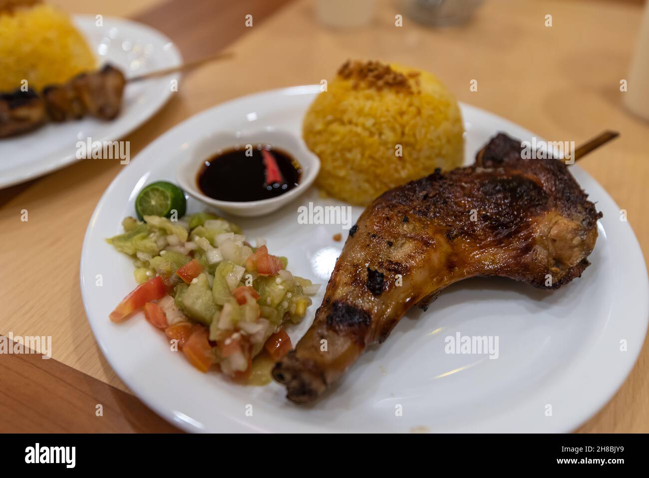 Popular Filipino food chicken inasal at the Restaurant Stock Photo - Alamy