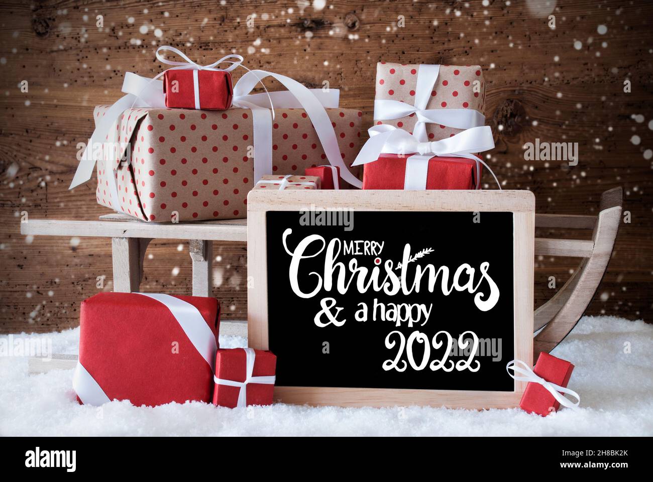 Sleigh, Gift, Snow, Snowflakes, Merry Christmas And A Happy 2022 Stock Photo