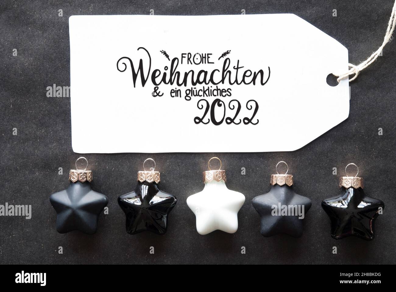 Black Christmas Ball, Label, Glueckliches 2022 Means Happy 2022 Stock Photo