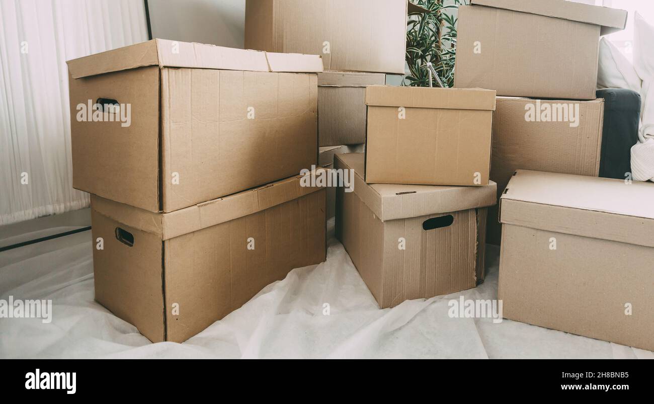 lot of cardboard boxes in the new apartment. Stock Photo
