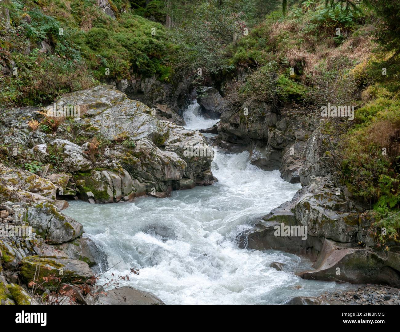 rapid flowing water as seen from the Wilde Wasser Weg (Wild water way) trail, Stubaital, Tyrol, Austria Stock Photo