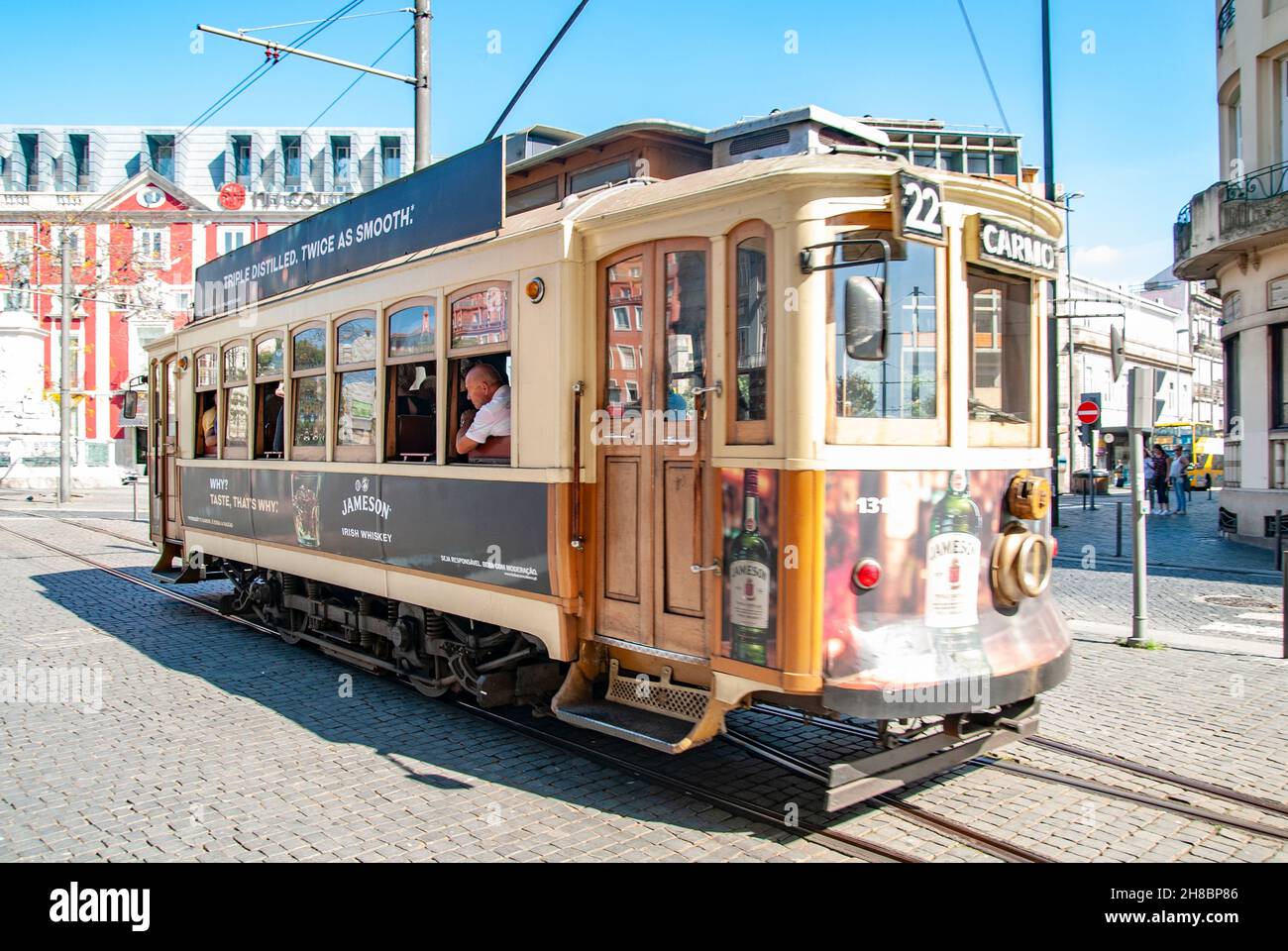 Old style heritage tram at Batalha Square (Praca da Batalha) in Se civil parish of Porto, Portugal Stock Photo