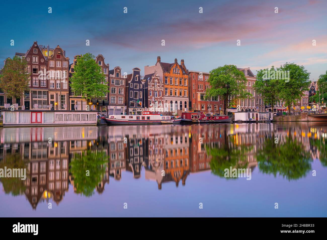 Downtown Amsterdam city skyline. Cityscape in Netherlands at sunset Stock Photo Alamy