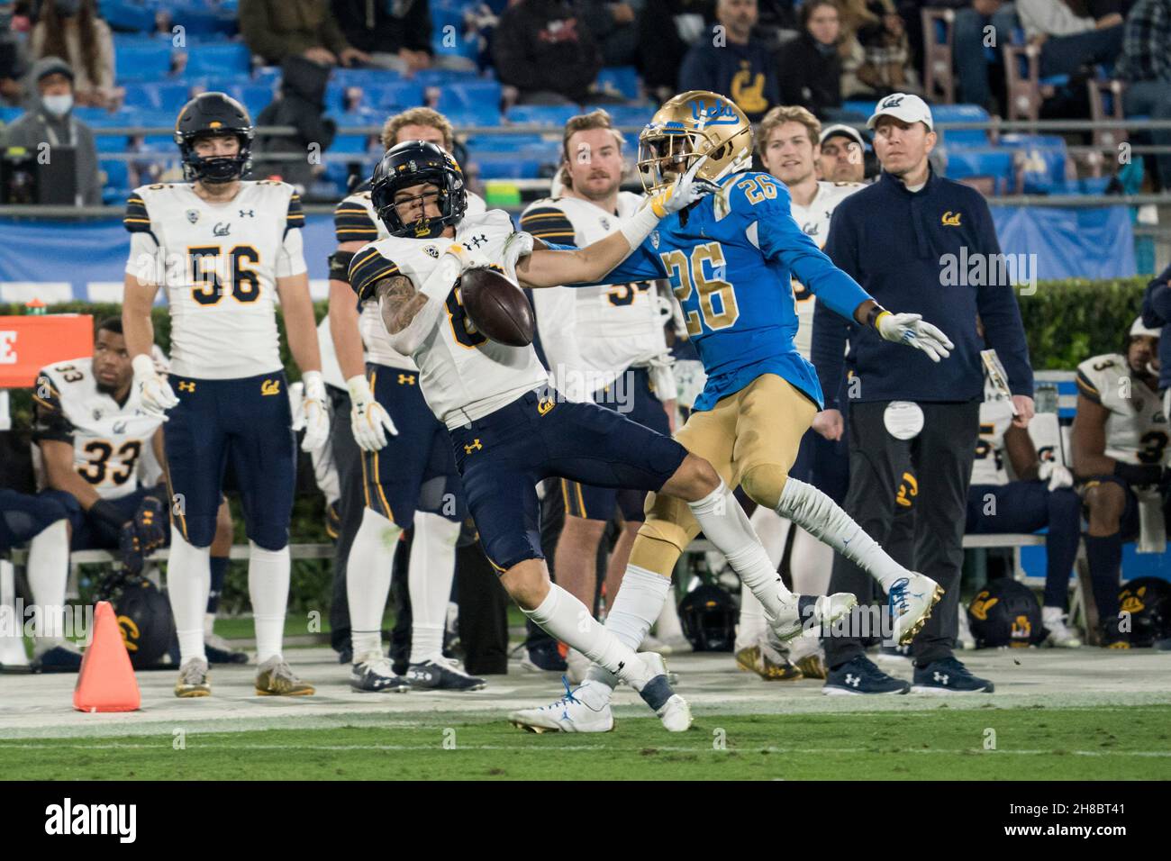 UCLA Bruins defensive back Devin Kirkwood (26) i so-called for pass interference against California Golden Bears wide receiver Trevon Clark (80) durin Stock Photo