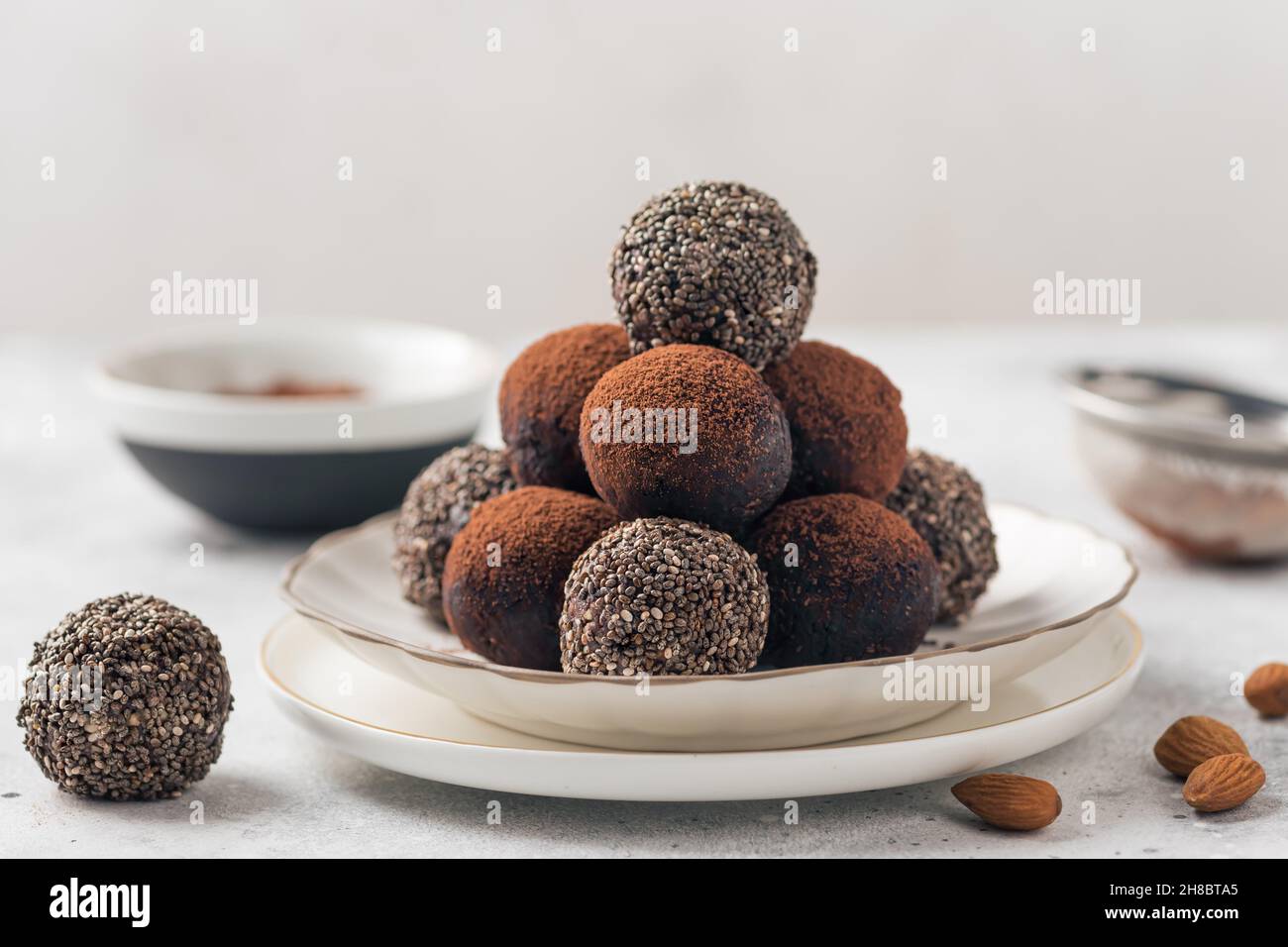 Raw energy balls made of dates, almonds, chia seeds, cocoa Stock Photo