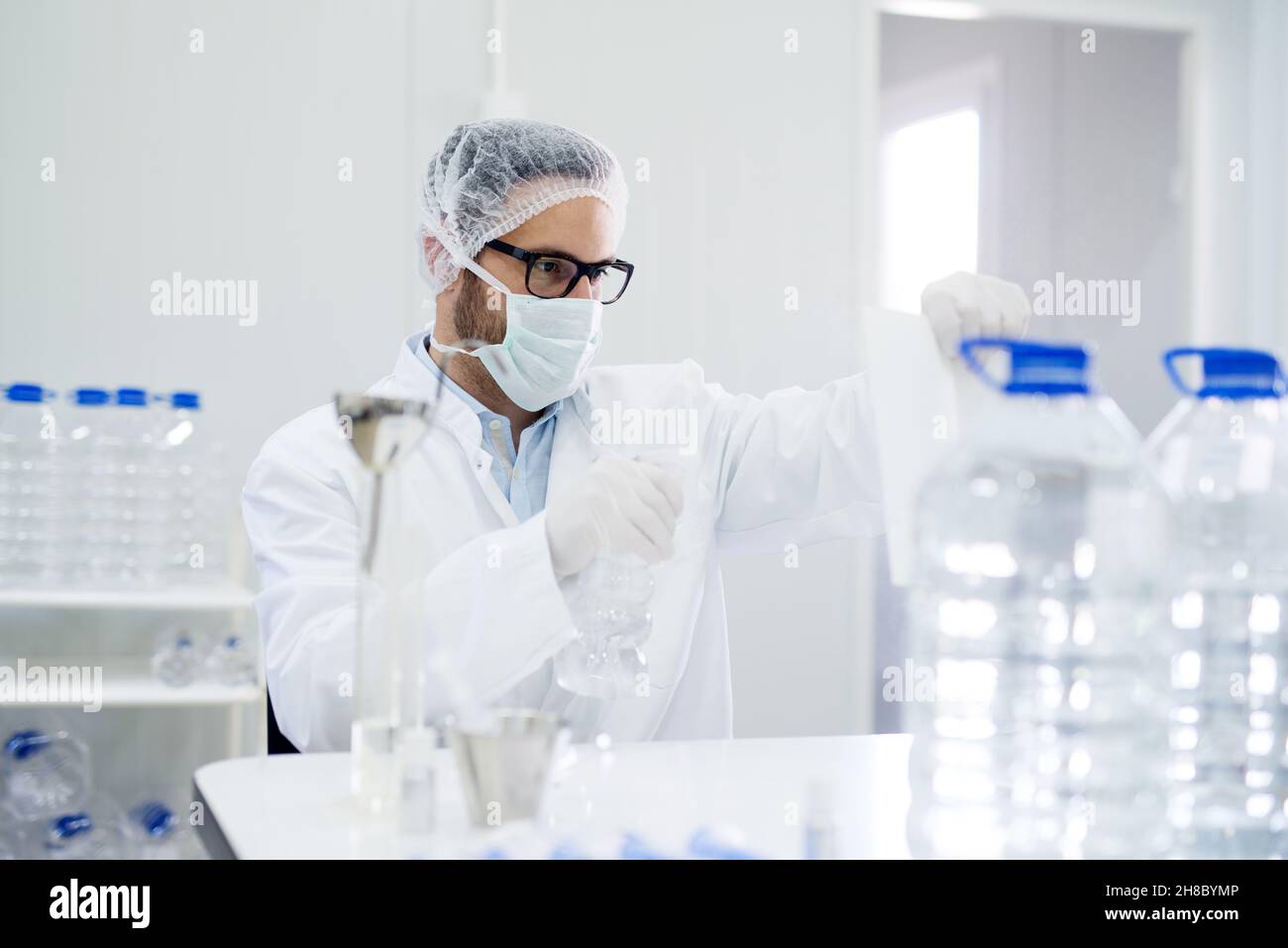 Lab technician doing chemical analysis. Testing chemical composition of