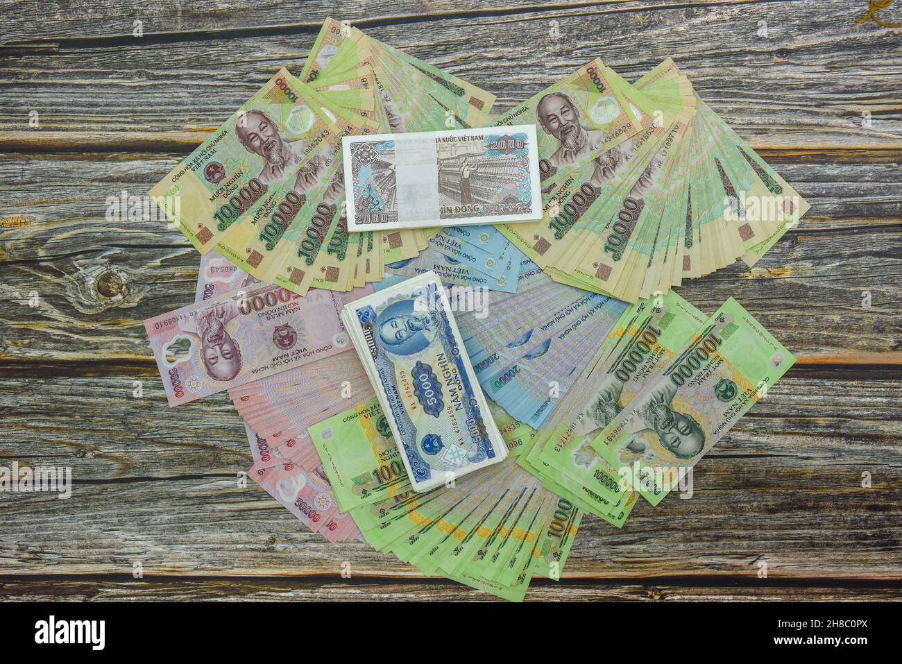 Vietnam currency or (Vietnamese dong) being circulated using plastic  materials Stock Photo - Alamy