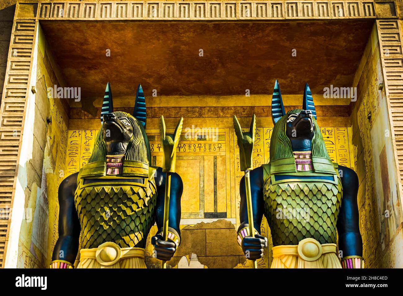 Singapore - Feb 26, 2021: At Revenge of the Mummy, two ancient Egyptian Statues guarding the entrance at Universal Studios Singapore. Stock Photo
