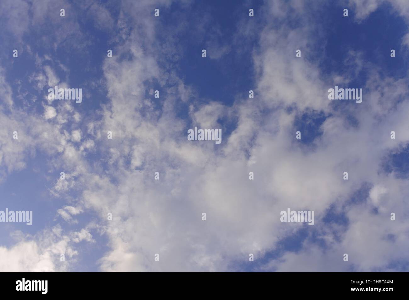 Images of the intensely blue sky with clouds, threatening clouds or just plain amazing .Beautiful images of the sky, cloudy, gloomy sky, with shades o Stock Photo