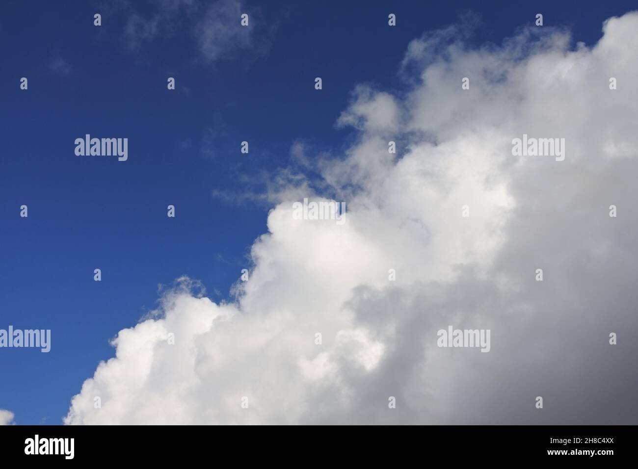 Images of the intensely blue sky with clouds, threatening clouds or just plain amazing .Beautiful images of the sky, cloudy, gloomy sky, with shades o Stock Photo