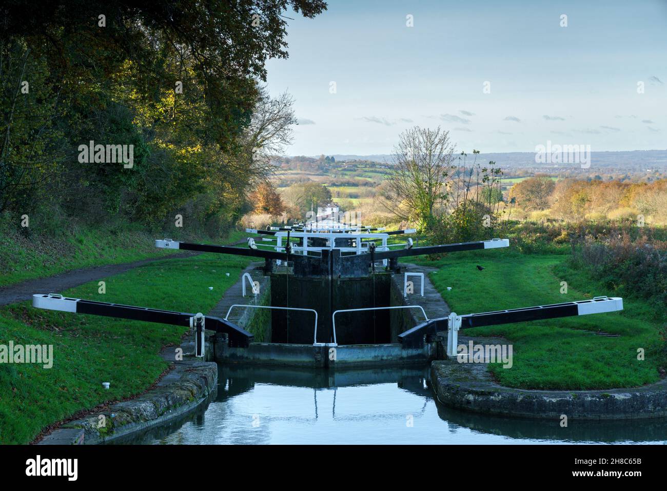 Steep flight of 16 locks at Caen Hill, Kennet and Avon Canal, Devizes, Wiltshire, England UK Stock Photo