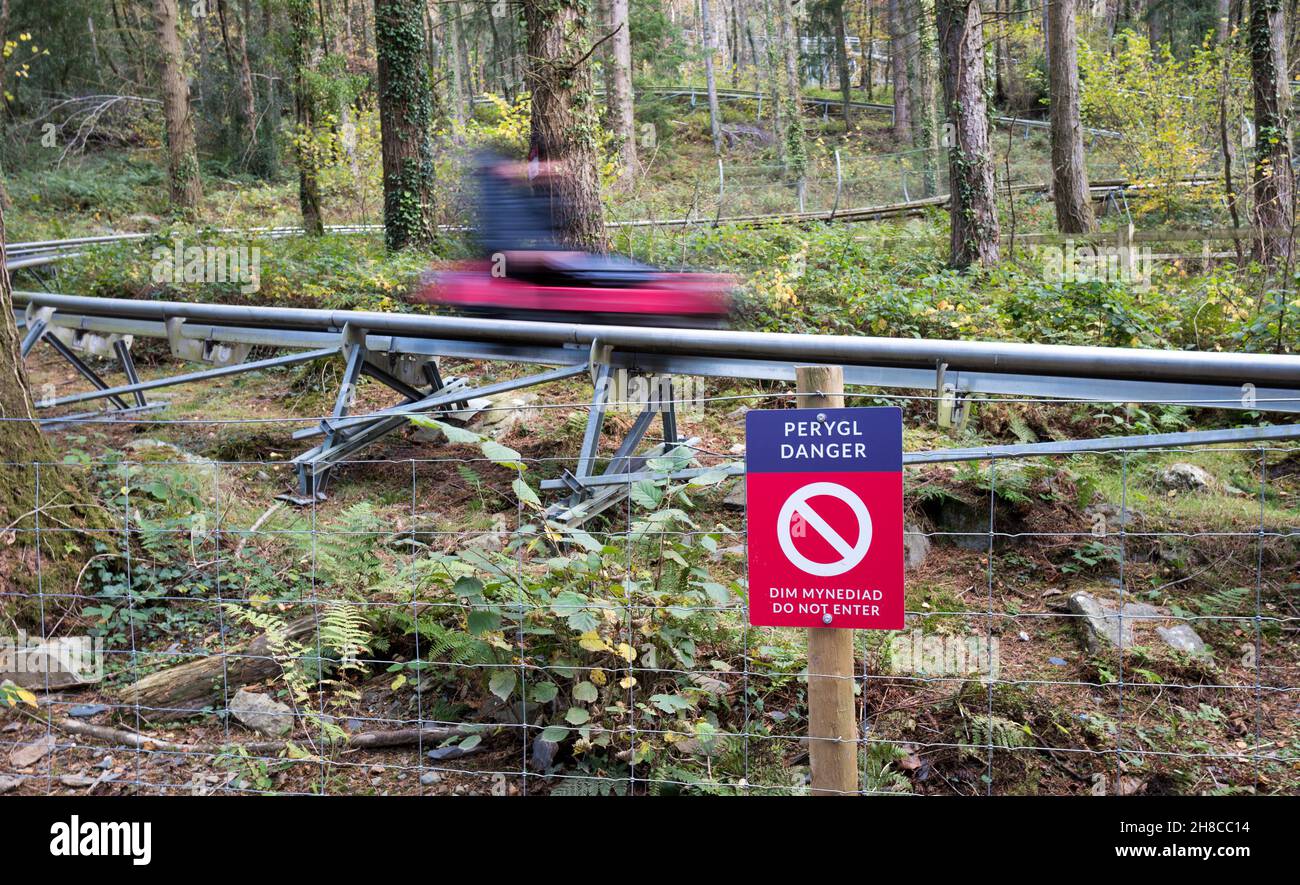 Danger and Do Not Enter sign at the forest coaster ride, adventure park, North Wales. Stock Photo