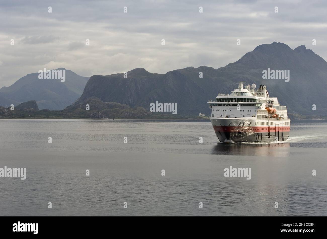 Norwegian Coastal Voyage Hurtigruten vessel Finnmarken near Ornes, Norway, Nordland Stock Photo