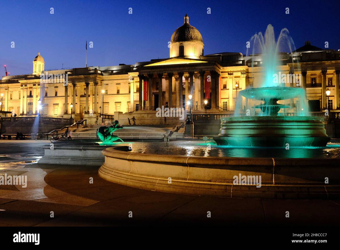 A quiet Trafalgar Square, featuring The National Gallery, during the Coronavirus pandemic lockdown, London Stock Photo