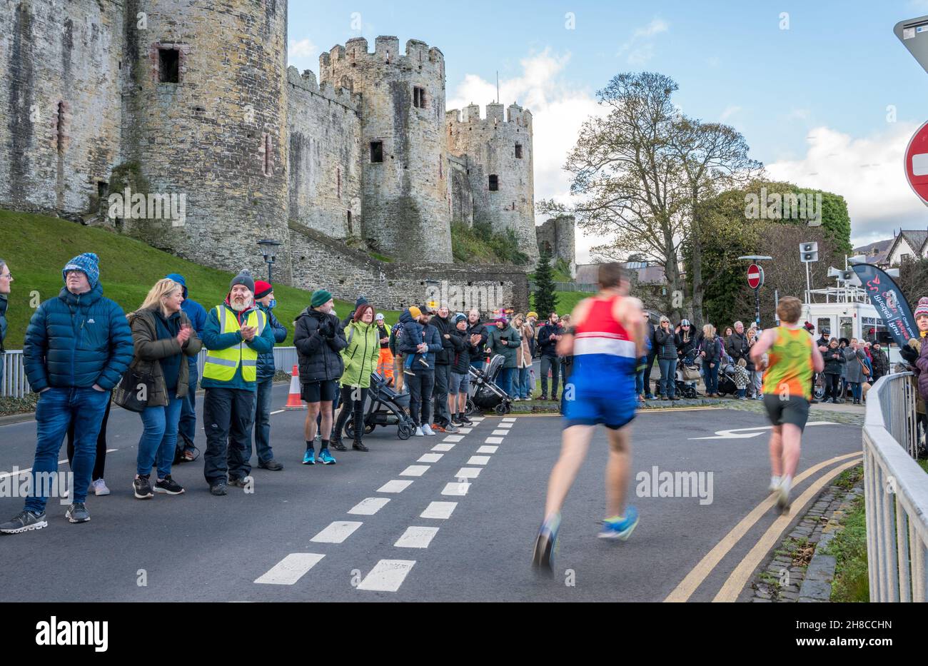 Runners at the finish line after competing in the Conwy 2021 half marathon, Wales. Stock Photo