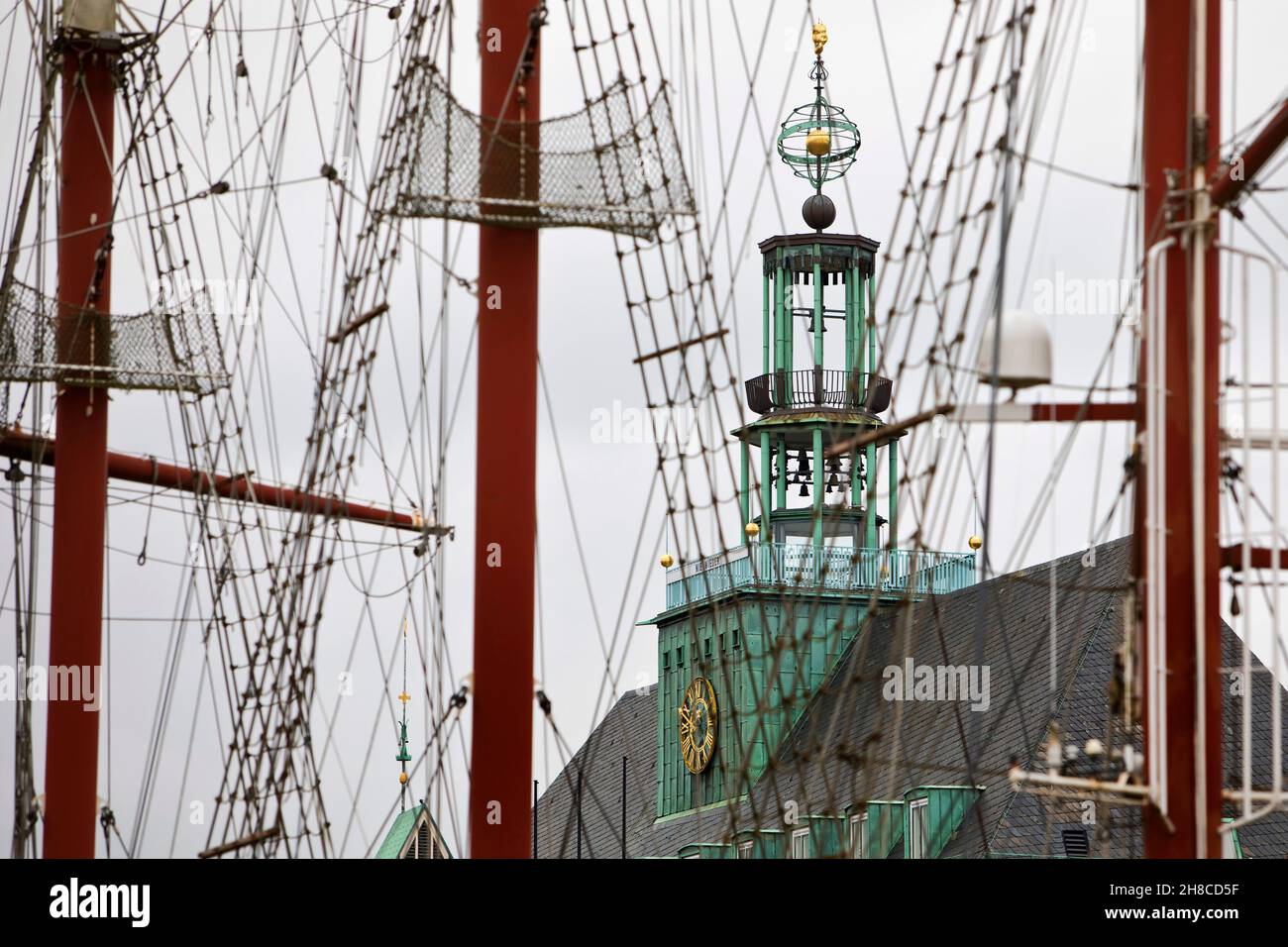 masts of sailing ship Heureka in front of Ostfriesisches Landesmuseum, Germany, Lower Saxony, East Frisia, Emden Stock Photo