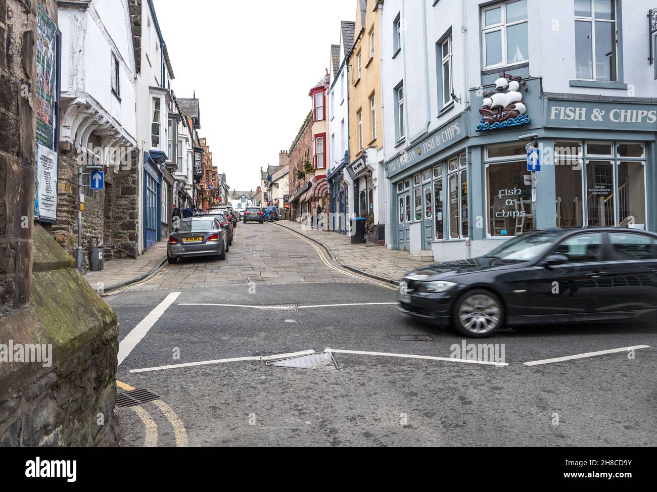 Parking along High street in the Stock Photo