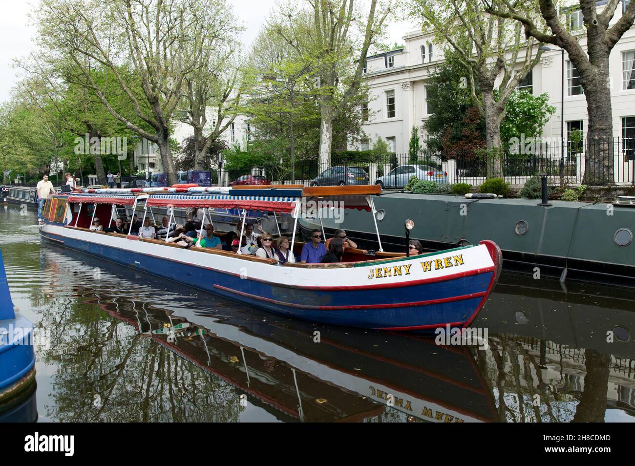 The Jenny Wren Narrow Boat giving passenger rides along the Regents Canal,  London, UK Stock Photo