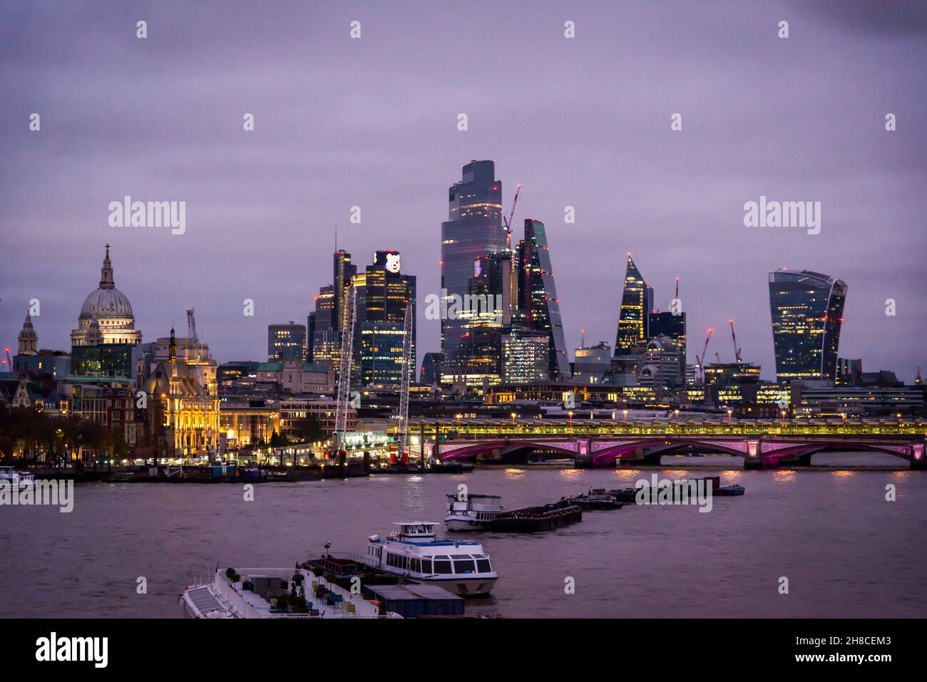 View of the City of London from Waterloo bridge at dusk, London, England, UK Stock Photo