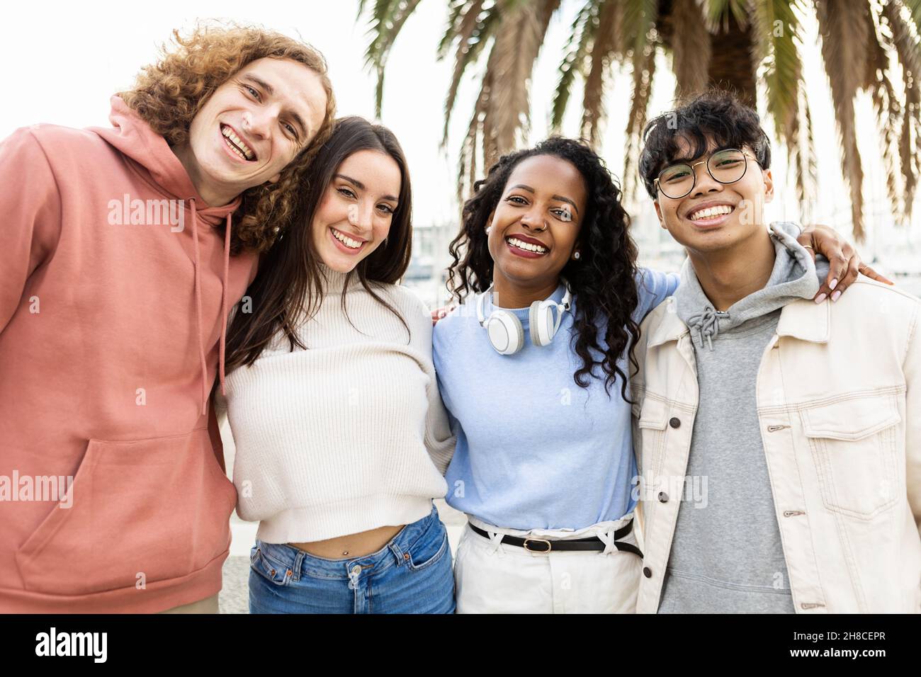 Portrait of united millennial group of friends outdoors Stock Photo