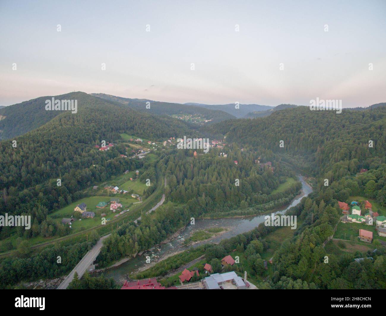 Small Village Near Deep Green Forest of Mountaines Stock Photo - Alamy