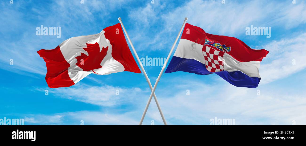 crossed national flags of Canada and Croatia flag waving in the wind at ...