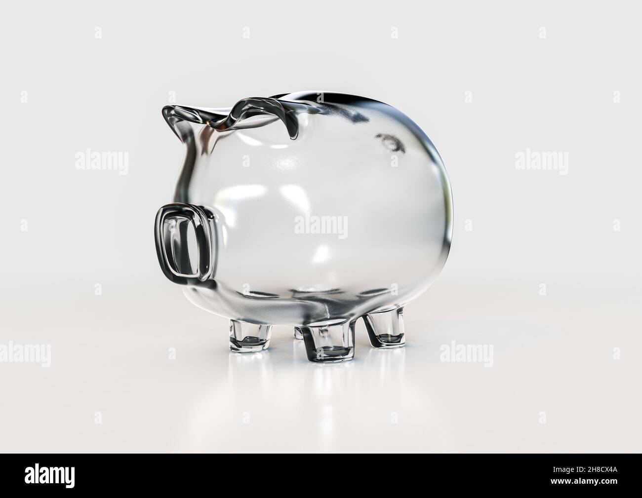 An empty transparent glass piggy bank on an isolated white background ...