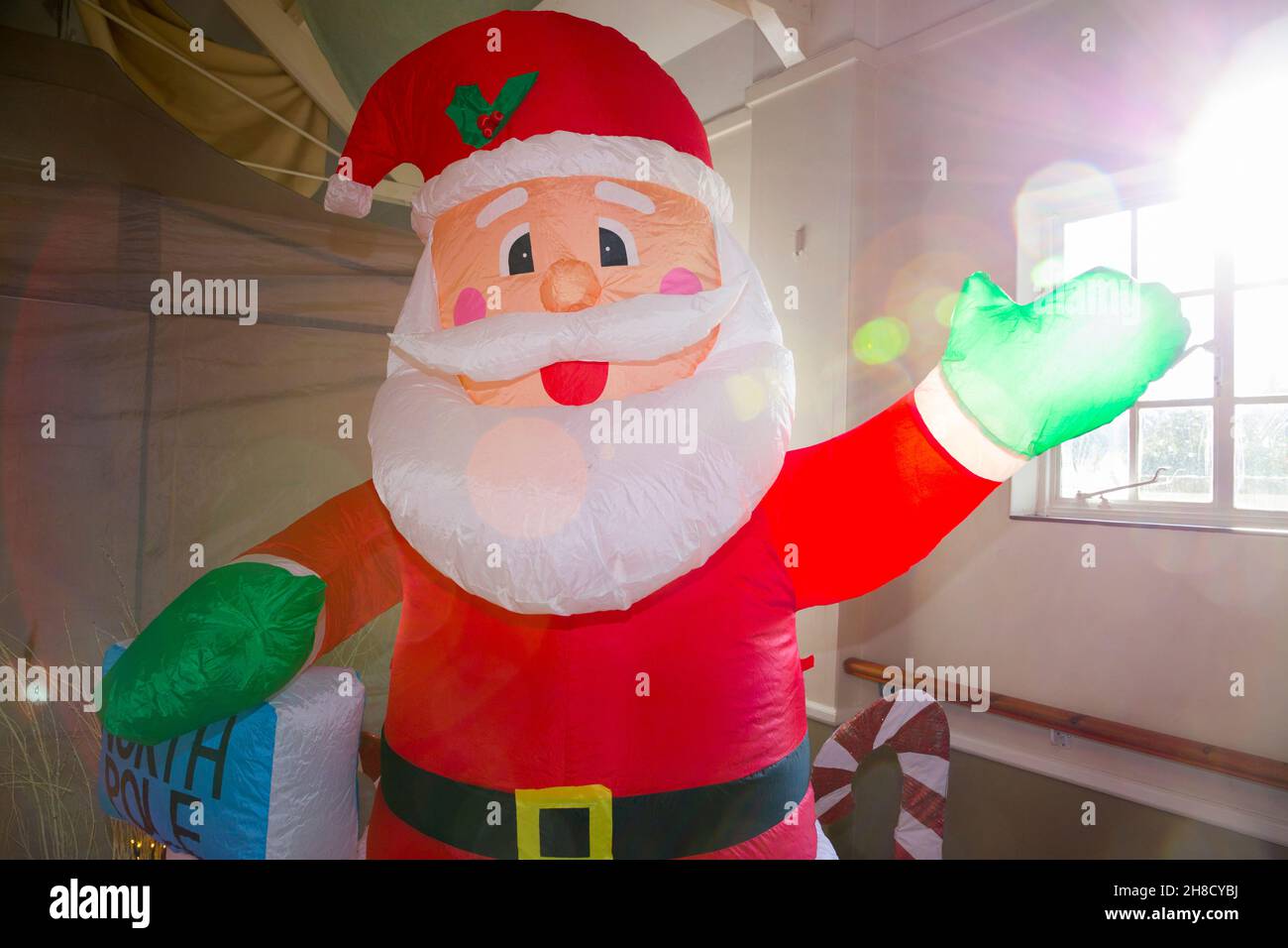 Decoration and inflatable blow up Santa decorations at the grotto prior