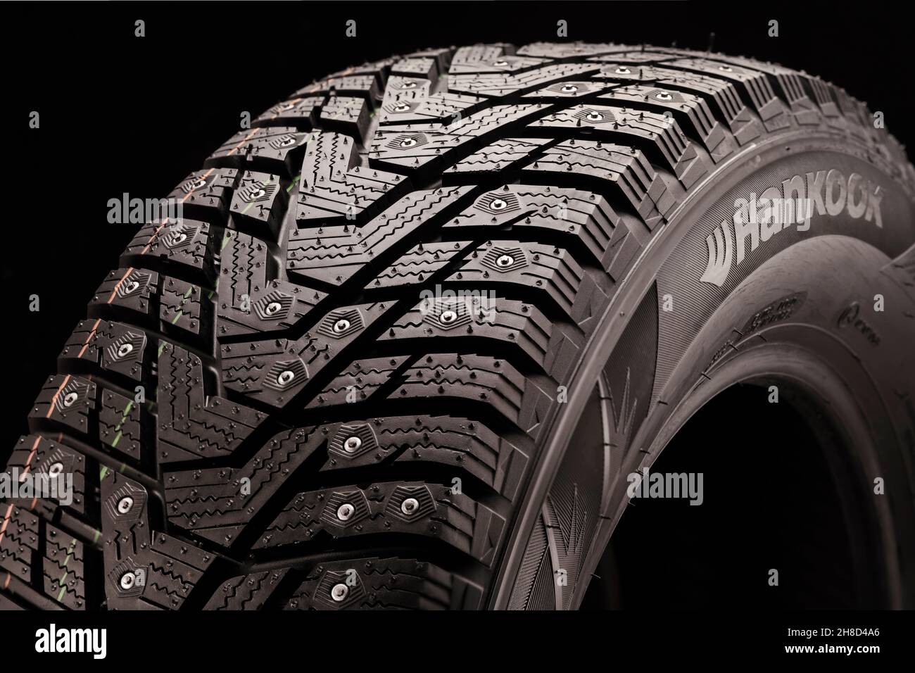 Hankook W 429- Korean Winter Tires Winter Studded Tire Side View Close-up  on Black Background Safety Winter Protector, Krasnoyarsk Russia 2021. 11.  19 Stock Photo - Alamy