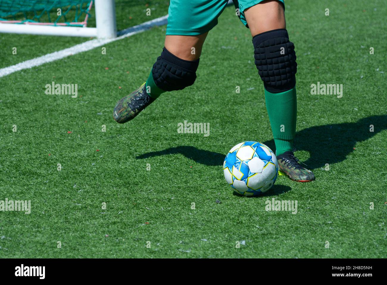 Football kicking a goal woman hi-res stock photography and images - Alamy