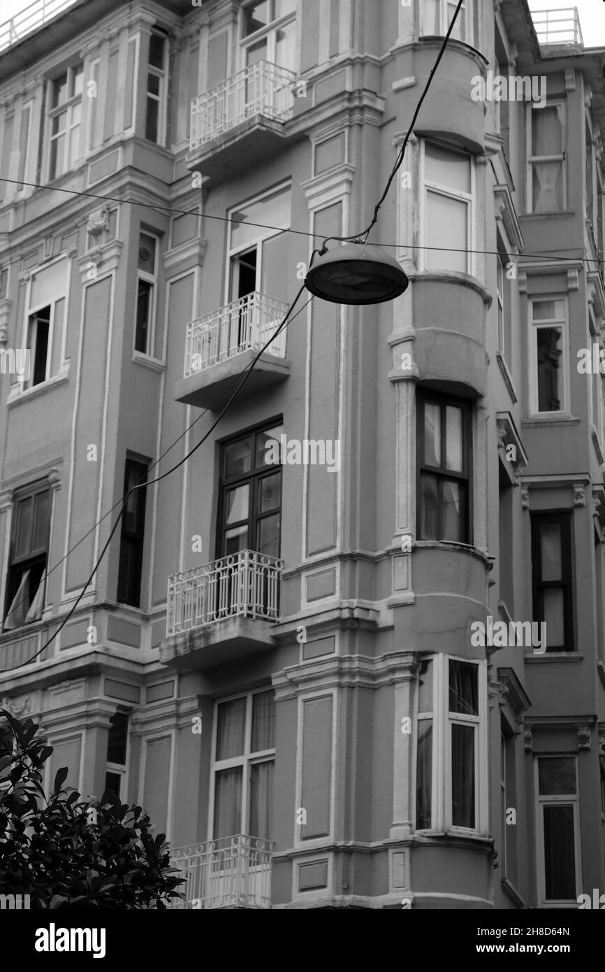 Vertical grayscale shot of the exterior of a building Stock Photo - Alamy