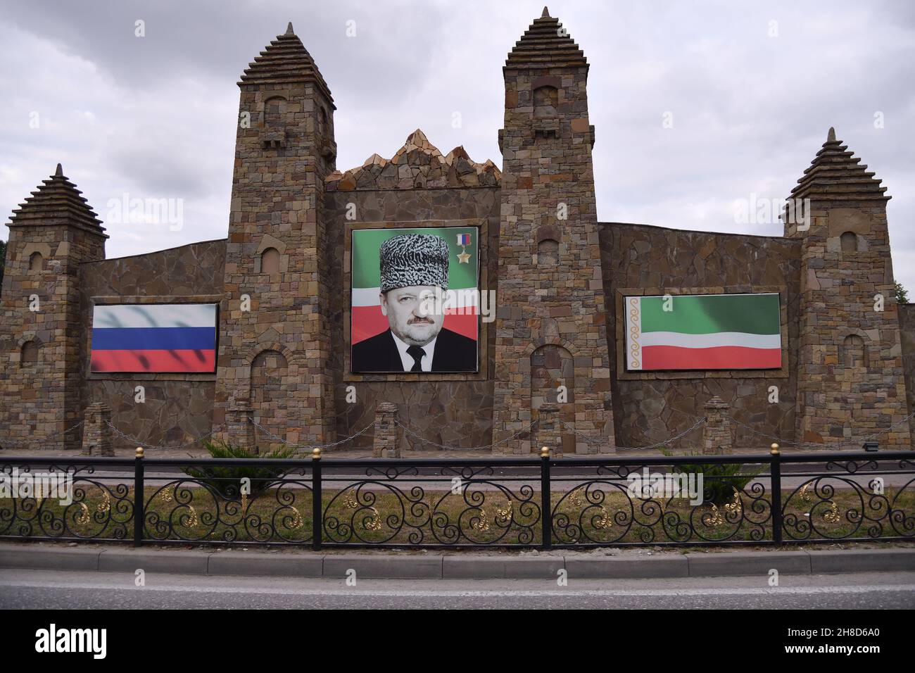 Grozny, Russia - Sept 13, 2021: Architecture in Grozny. Portrait of the former president of the Chechnya Akhmad-Khadzhi Abdulkhamidovich Kadyrov and r Stock Photo
