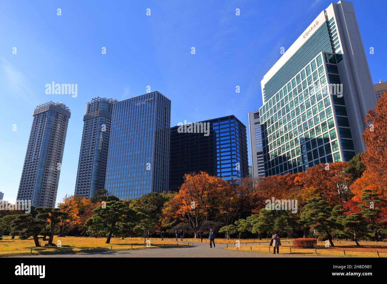 TOKYO, JAPAN - DECEMBER 2, 2016: Autumn skyline seen from Hama Rikyu Gardens in Tokyo, Japan. Tokyo is the capital city of Japan. 37.8 million people Stock Photo