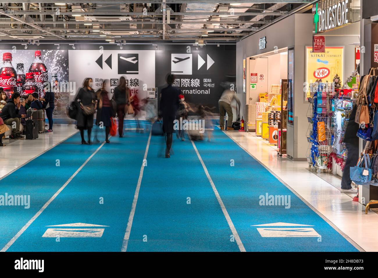 tokyo, japan - december 06 2019: Symbols leading to the international and domestic flights departure gates on the floor of the Narita International Ai Stock Photo