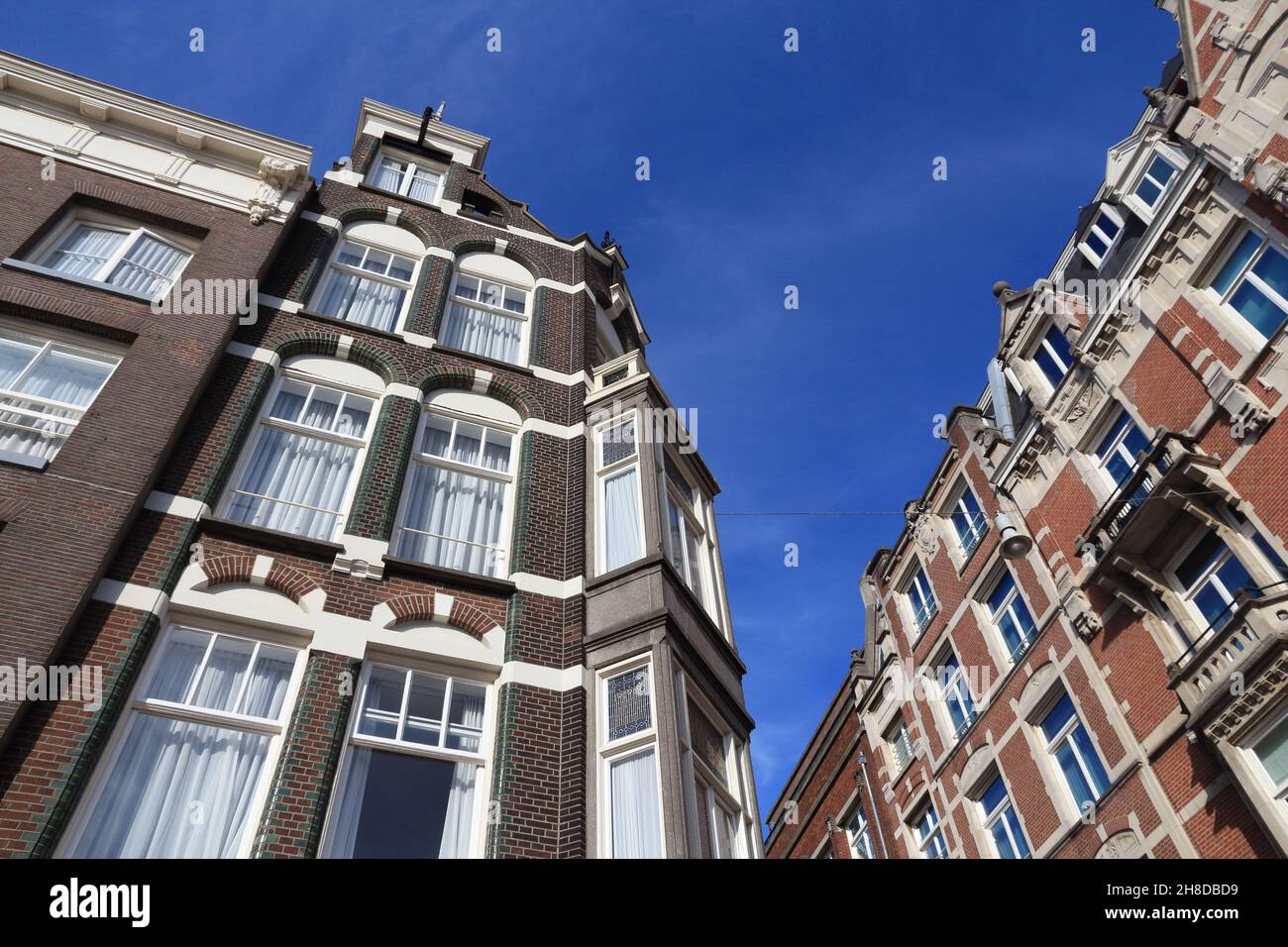 Amsterdam city architecture Oude Turfmarkt residential buildings. Netherlands rowhouse Stock Amsterdam city architecture Oude Turfmarkt residential buildings. Netherlands rowhouse Stock