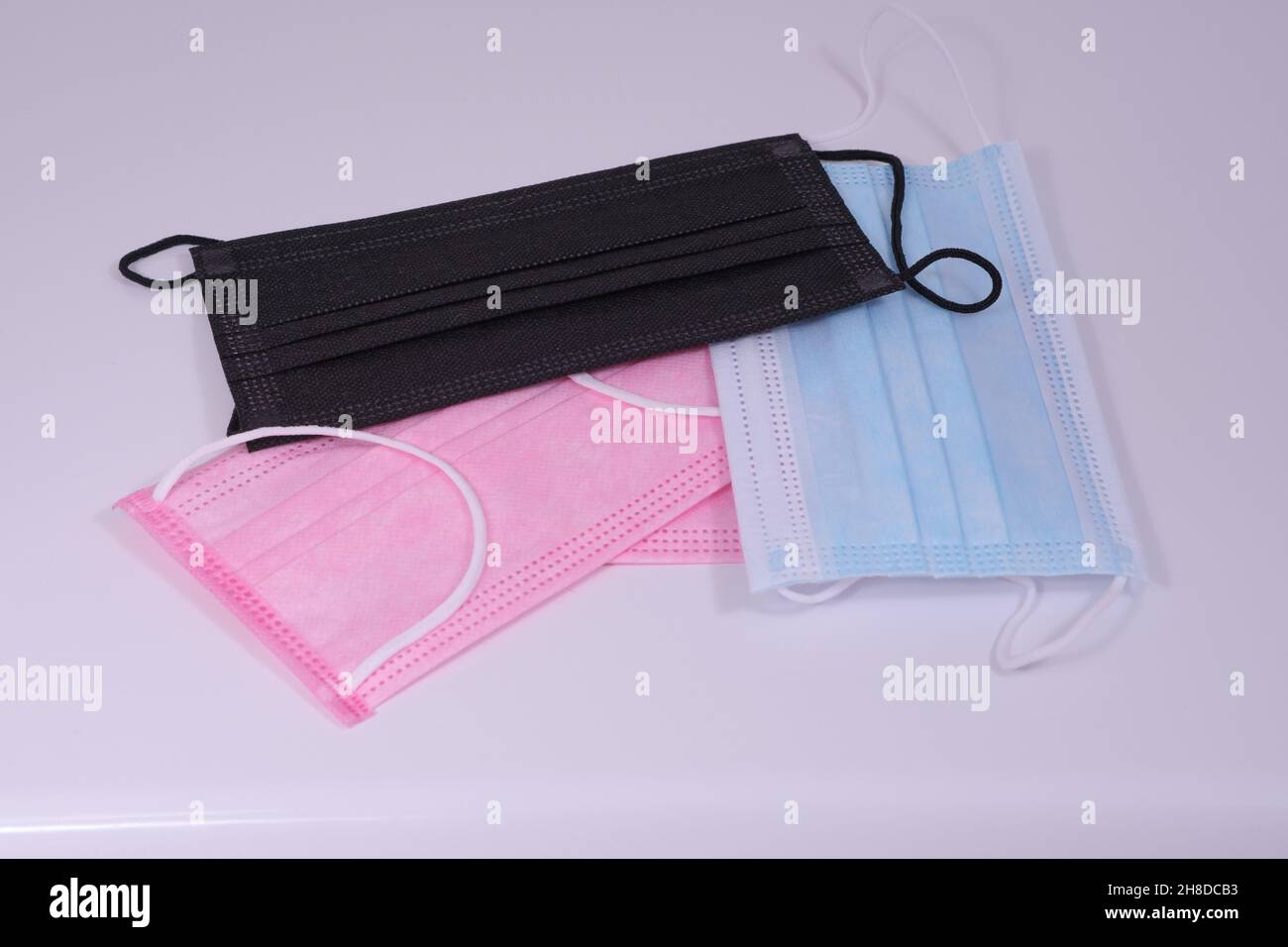 Disposable black surgical masks hi-res stock photography and images - Alamy