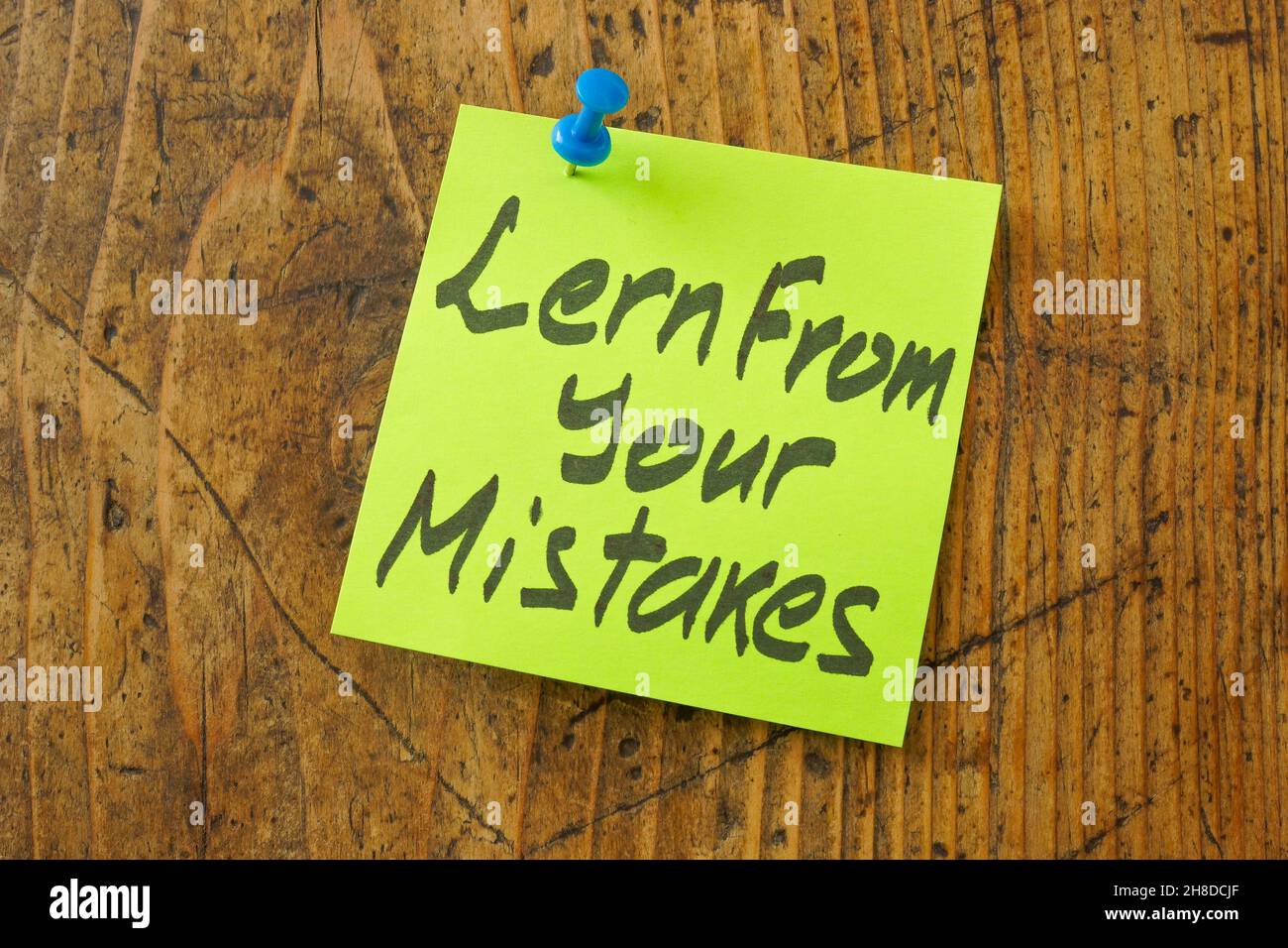 Learn from your mistakes inscription on the sticker. Stock Photo