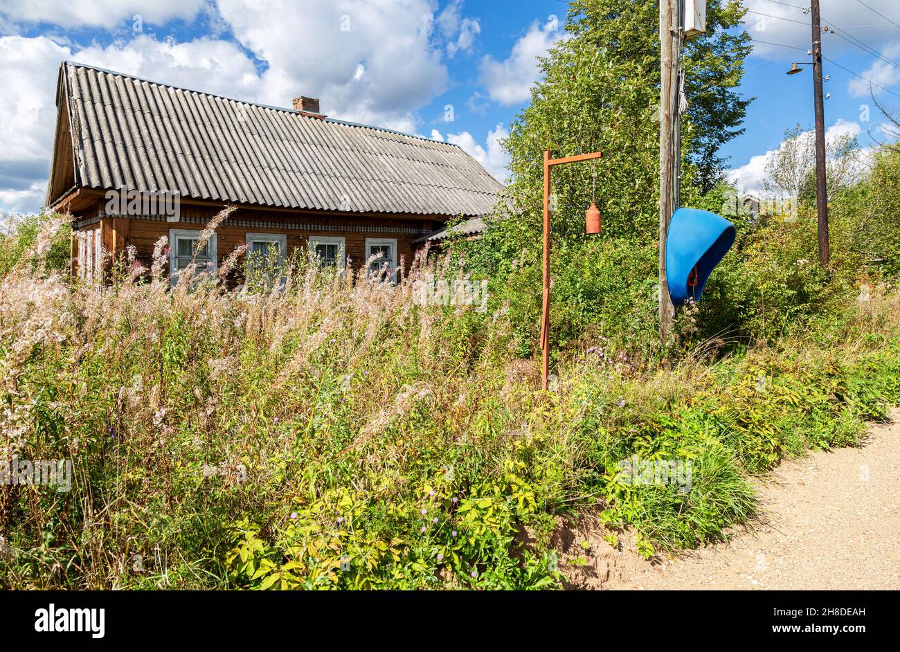 Abandoned old rural wooden house in russian village in summer sunny day ...