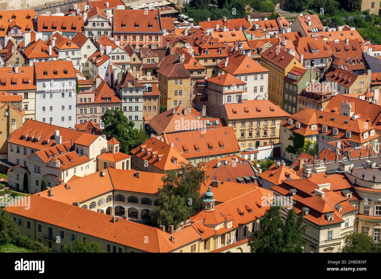The red roof tops and the colourful, historic buildings of Prague's Malá Strana Stock Photo