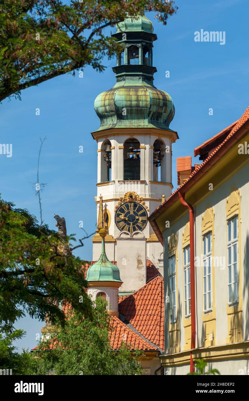 Kilian Ignaz and Kristof Dietzenhofer's ornate octagonal bell tower on the Prague Loreto Palace in Hradčany Stock Photo