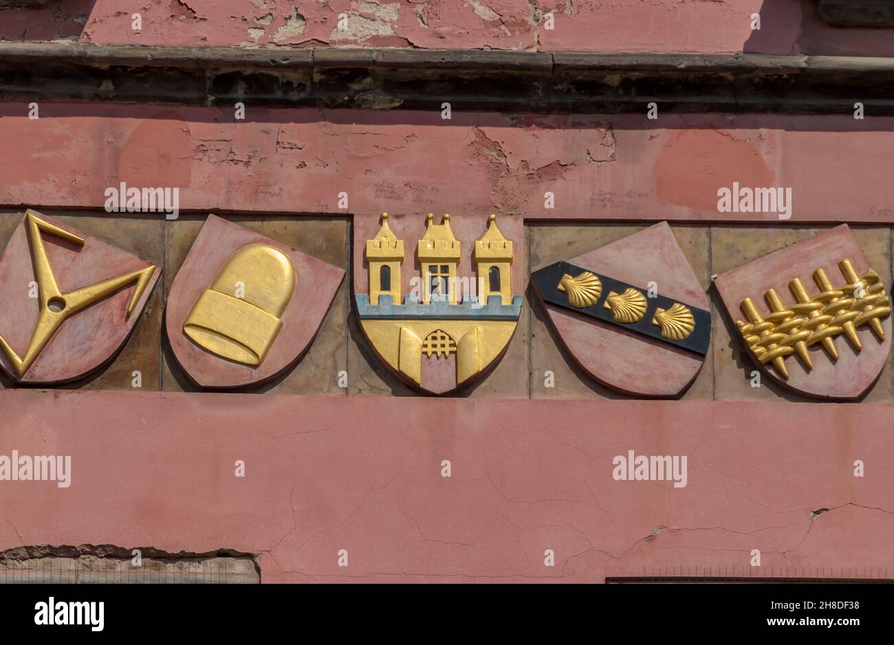 Detail of 5 of the 18 city councillor's coats of arms on the West House (Dům kramáře Kříže) a historic merchant's house in Prague's Staroměstské nám. Stock Photo
