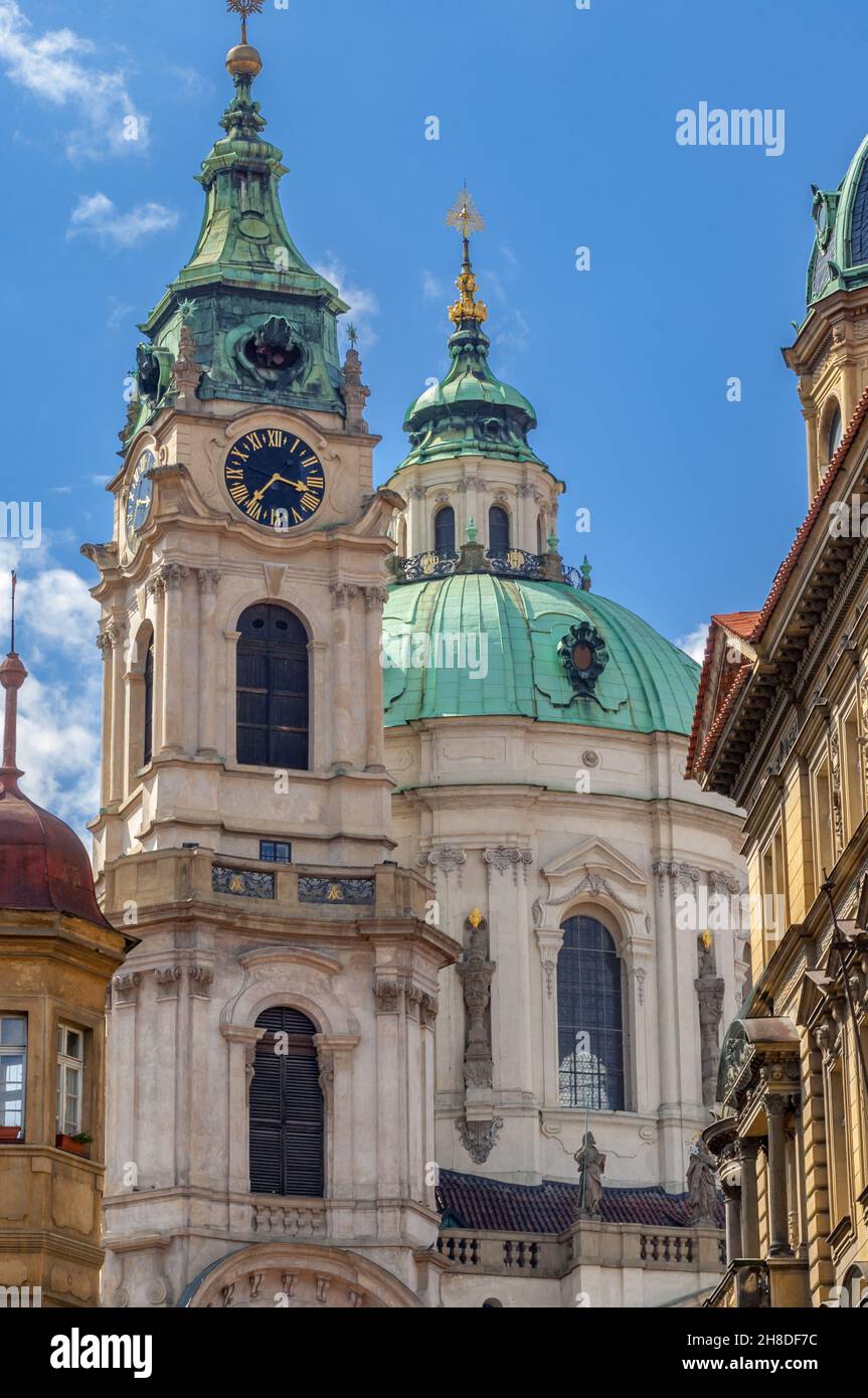 Christoph Dientzenhofer's Baroque dome, lantern and bell tower of St Nicholas's church in Malostranské Square in Prague's picturesque Malá Strana Stock Photo