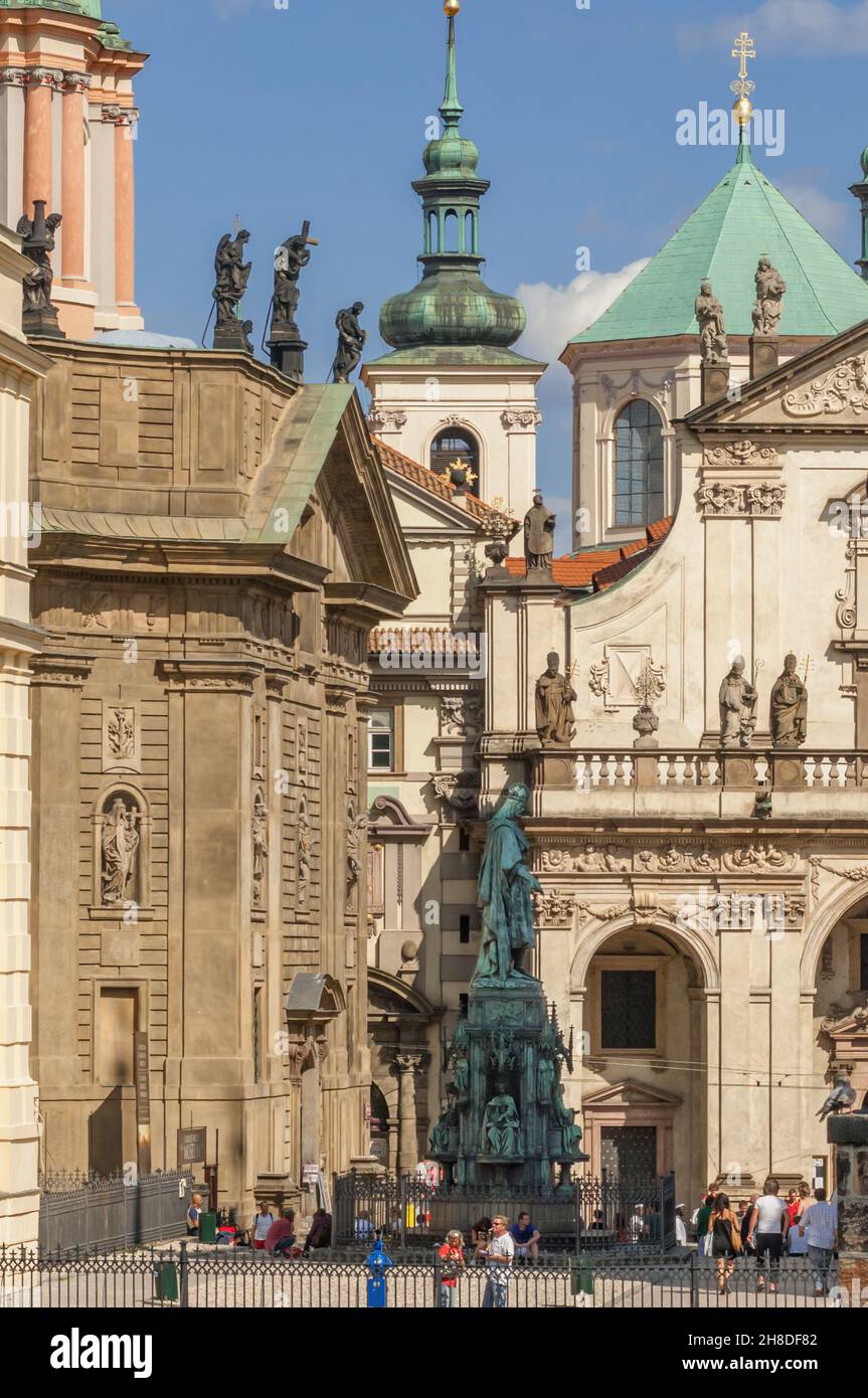 Prague's Křižovnické náměstí (Crusader Knight's Square) with its statue of Charles IV flanked by the churches of St Salvador and St Francis Assisi Stock Photo
