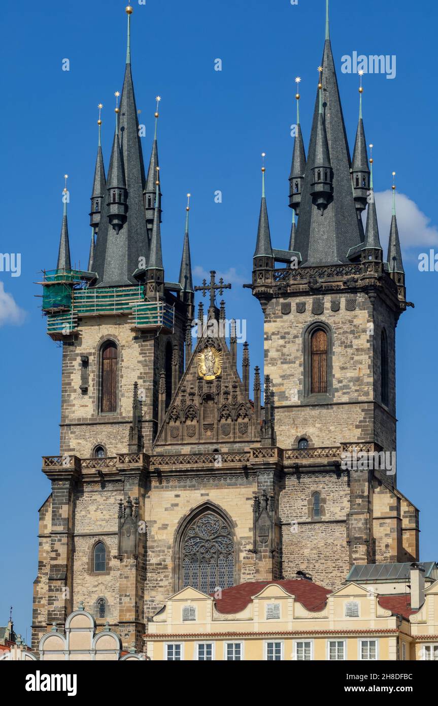 The 80m tall twin Gothic towers, and multiple spires, of the Church of Our Lady before Týn in Prague's Old Town Square. Stock Photo