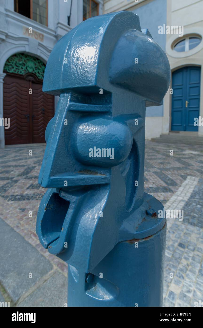 The first of a row of ornate blue cubist traffic bollards at the corner of  Malostranske namesti in Prague Stock Photo