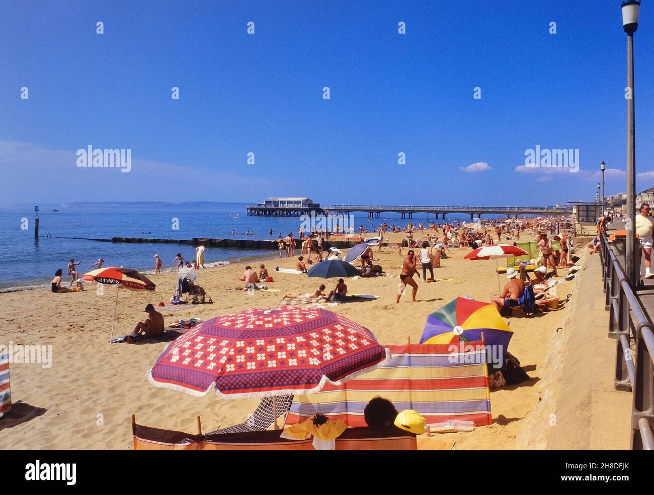 seafront and pier, Dorset, England, UK. Circa 1980's Stock