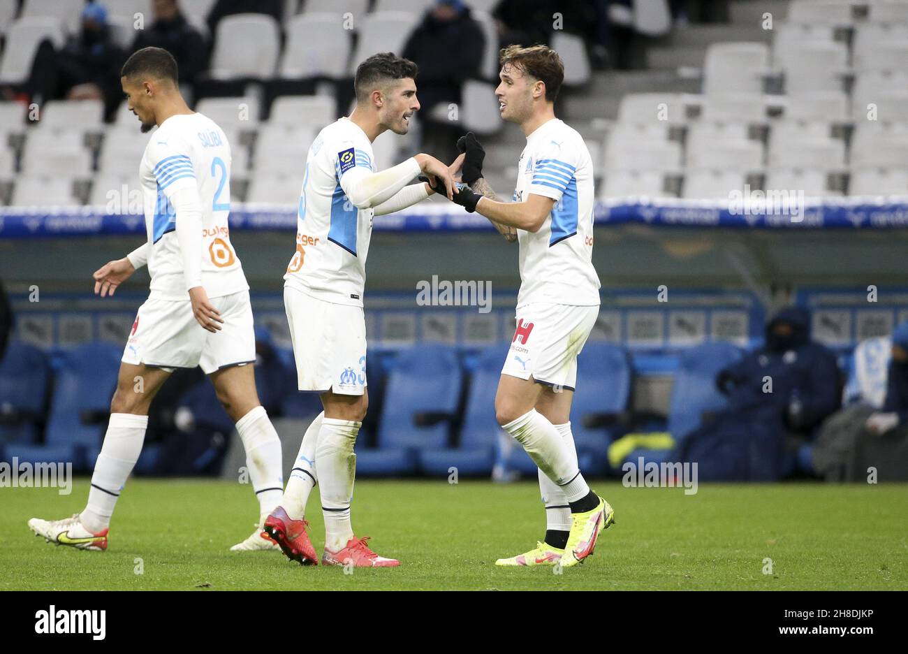 Pol Lirola of Marseille celebrates his goal with Alvaro Gonzalez (left) during the French championship Ligue 1 football match between Olympique de Marseille and ESTAC Troyes on November 28, 2021 at Orange Velodrome stadium in Marseille, France - Photo: Jean Catuffe/DPPI/LiveMedia Stock Photo
