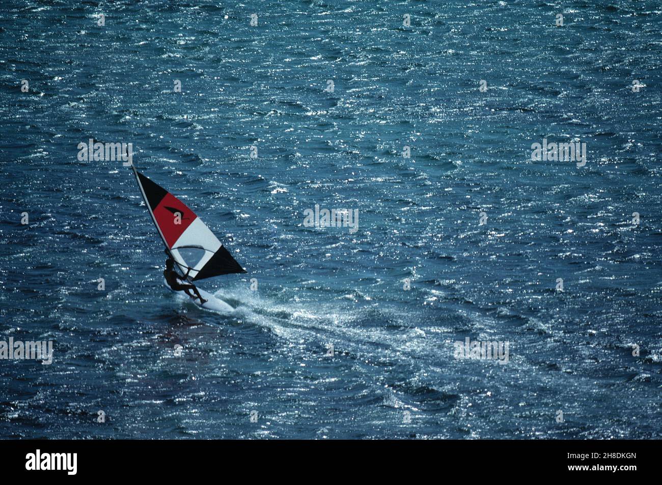New Caledonia. Nouméa. Aerial view of man on sailboard. Stock Photo