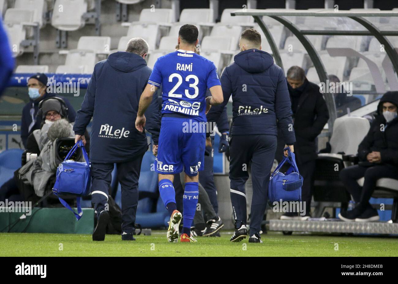 Adil Rami of Troyes leaves the pitch because of an injury during the French championship Ligue 1 football match between Olympique de Marseille and ESTAC Troyes on November 28, 2021 at Orange Velodrome stadium in Marseille, France - Photo: Jean Catuffe/DPPI/LiveMedia Stock Photo